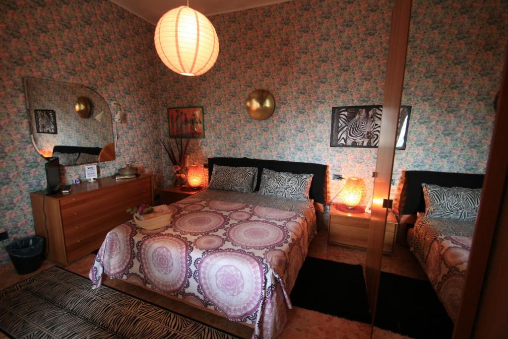 Postel nebo postele na pokoji v ubytování B&B Frontepista