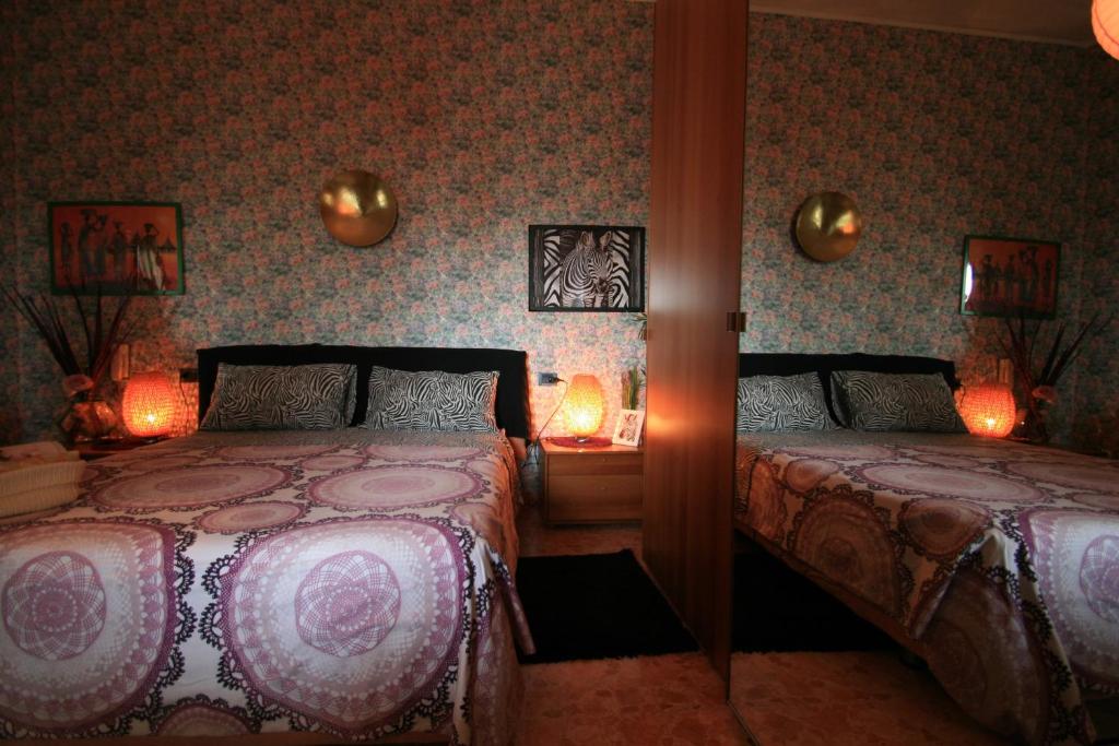 Postel nebo postele na pokoji v ubytování B&B Frontepista