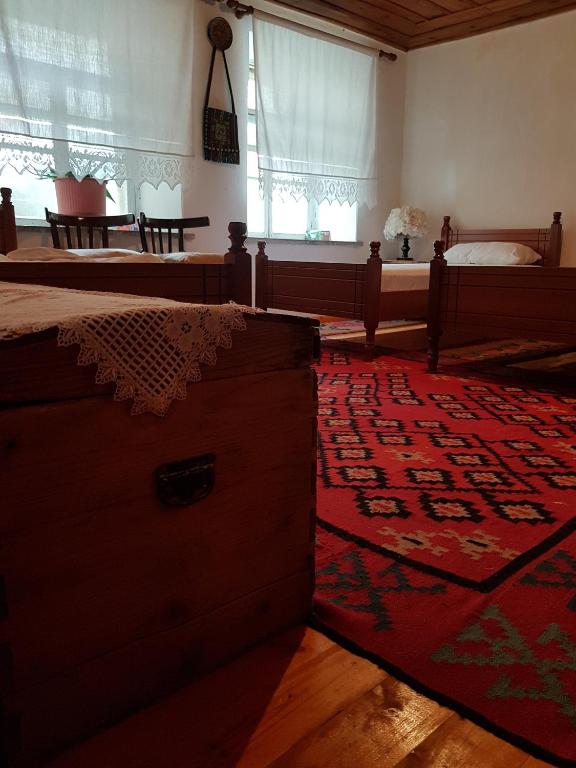 Postel nebo postele na pokoji v ubytování Eva Guesthouse
