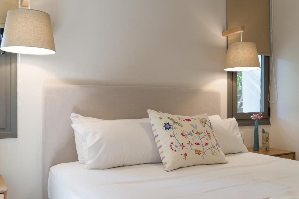 Posteľ alebo postele v izbe v ubytovaní Lemonia Accommodations