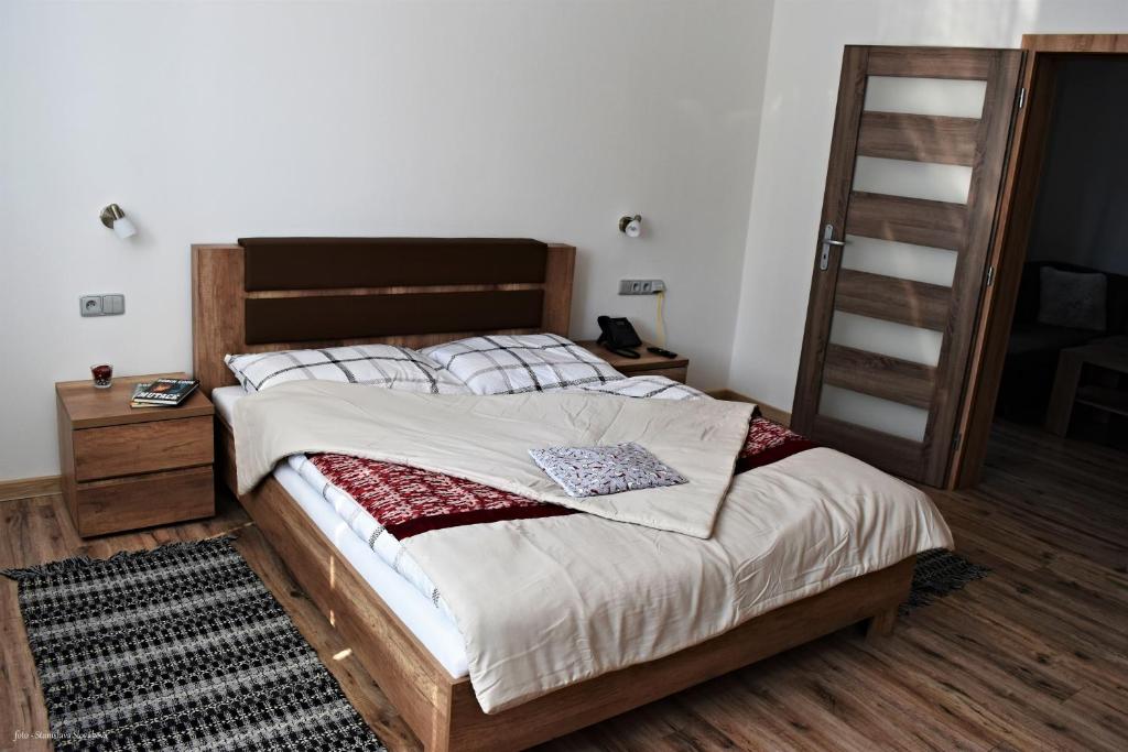 Postel nebo postele na pokoji v ubytování Penzion u Čápa Příbor