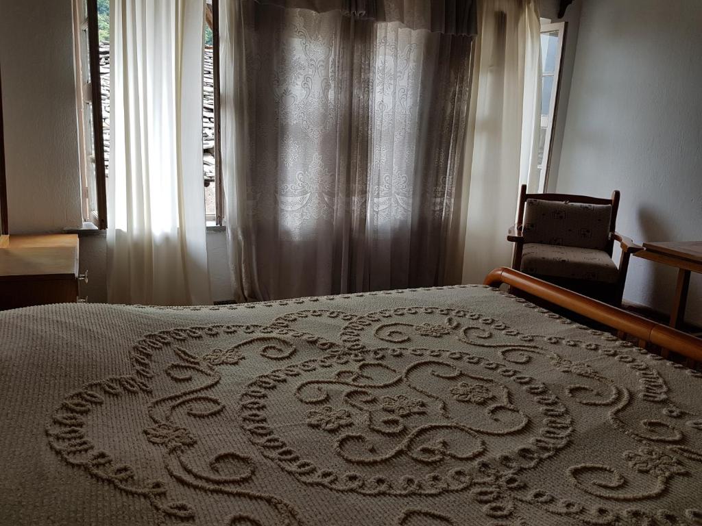 Postel nebo postele na pokoji v ubytování Eva Guesthouse