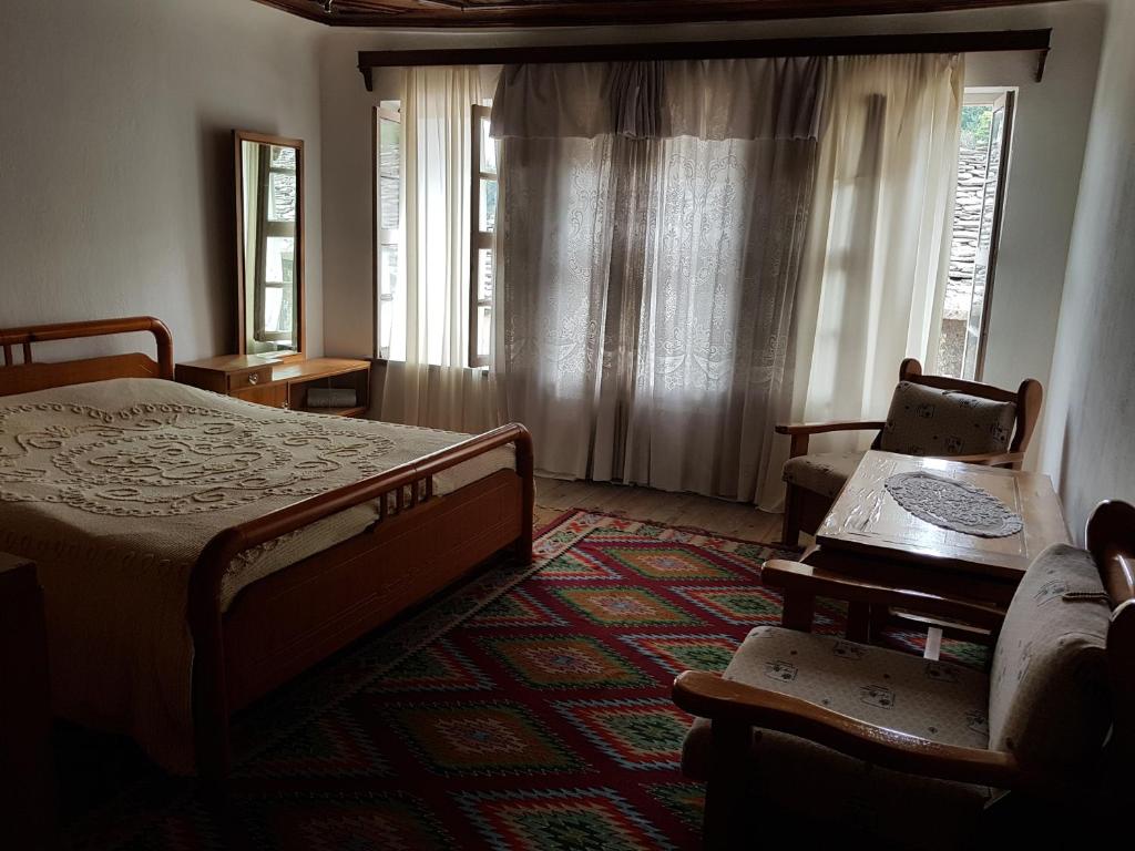 Postel nebo postele na pokoji v ubytování Eva Guesthouse