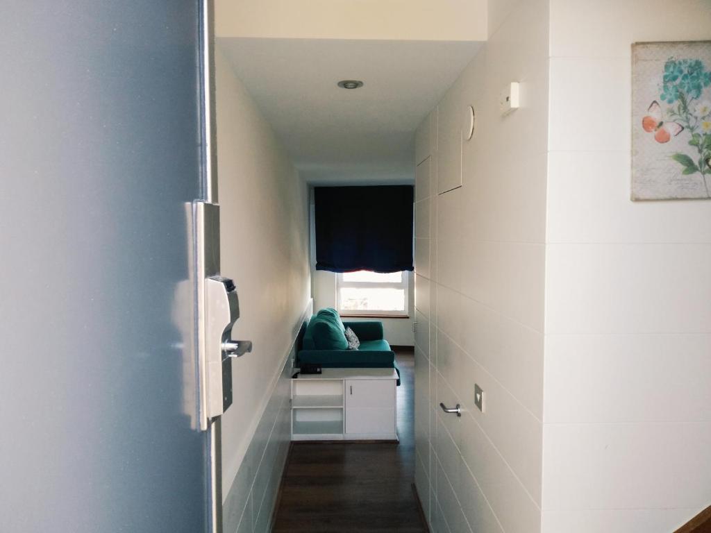 Postel nebo postele na pokoji v ubytování Apartamentos El Caserio