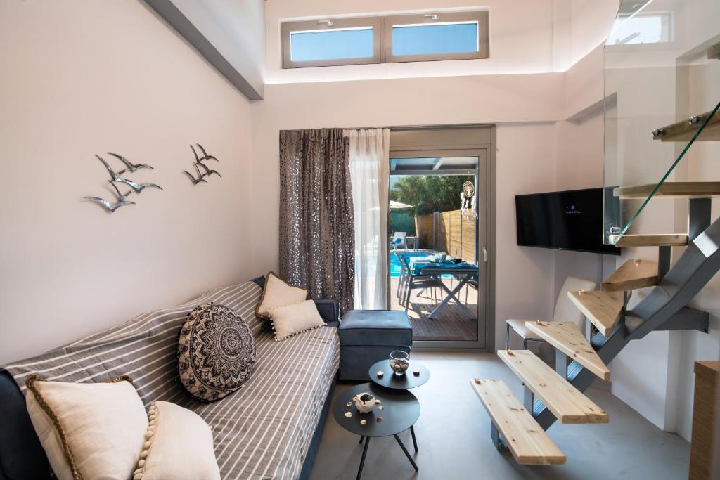 TV a/nebo společenská místnost v ubytování Lefkas Villas