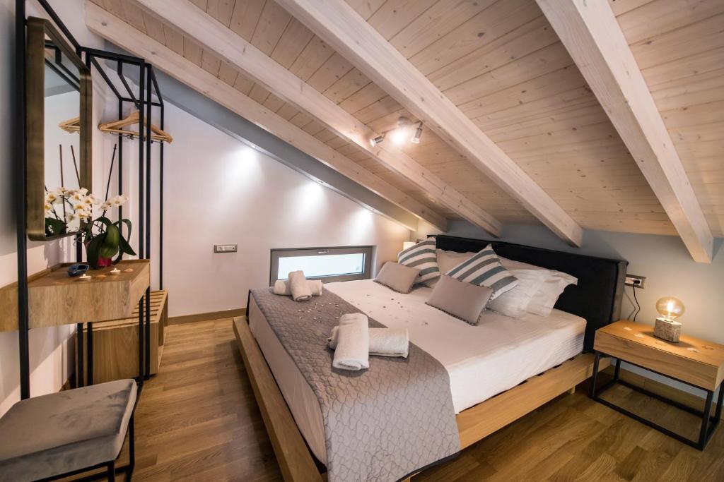 Postel nebo postele na pokoji v ubytování Lefkas Villas