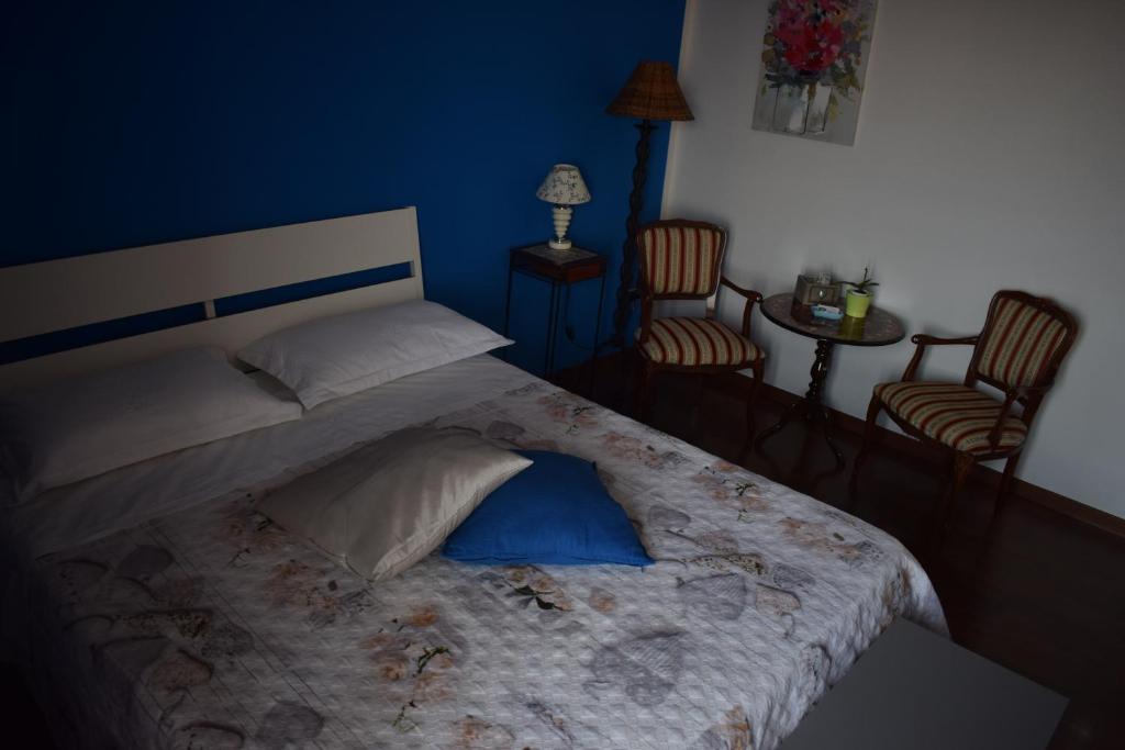 Łóżko lub łóżka w pokoju w obiekcie B & B Arco di Sole