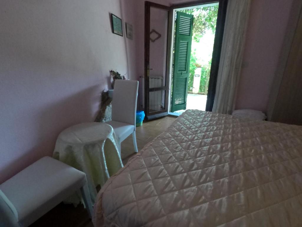 Postel nebo postele na pokoji v ubytování Cinqueterre Holidays