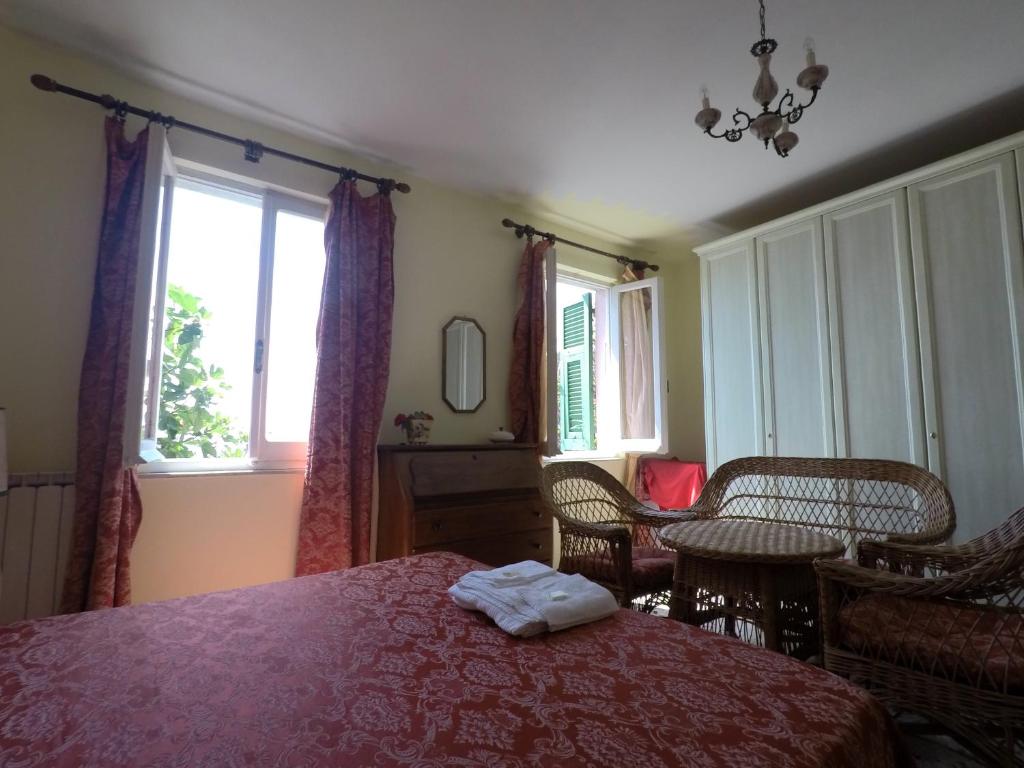 Postel nebo postele na pokoji v ubytování Cinqueterre Holidays