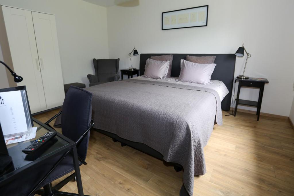 Postel nebo postele na pokoji v ubytování B&B Le Bois de Champia