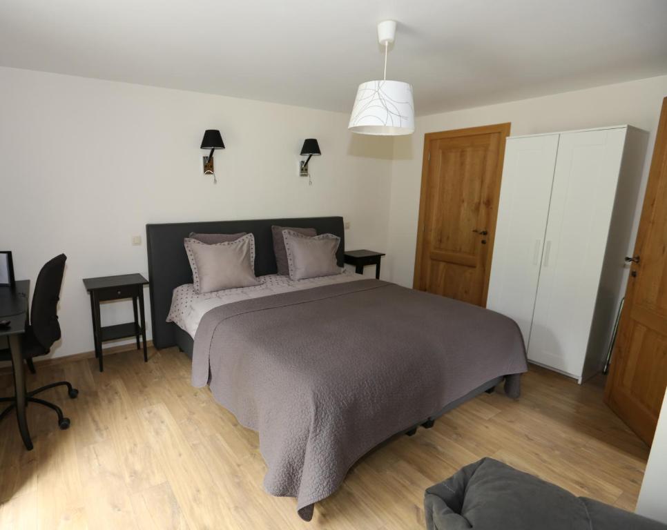 Postel nebo postele na pokoji v ubytování B&B Le Bois de Champia