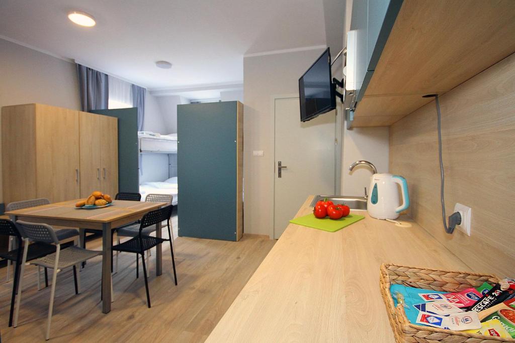 Kuchyň nebo kuchyňský kout v ubytování Willa Park Apartamenty