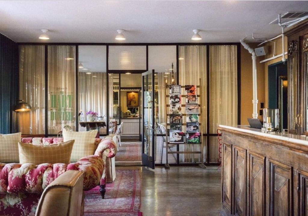 a lobby with couches and a bar in a store at Palihotel Melrose in Los Angeles