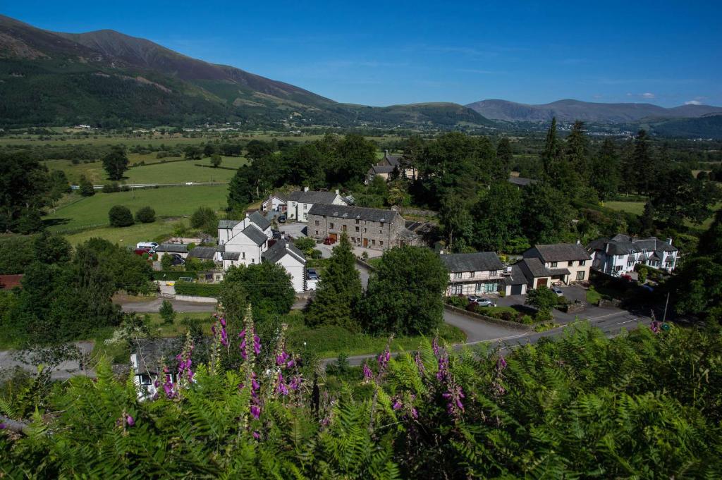 a village with houses and trees and a road at Lords Seat Bed & Breakfast in Keswick