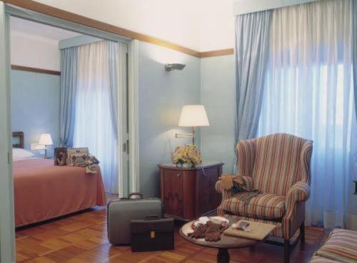 Łóżko lub łóżka w pokoju w obiekcie Hotel&Ristorante Miramonti Palazzo Storico