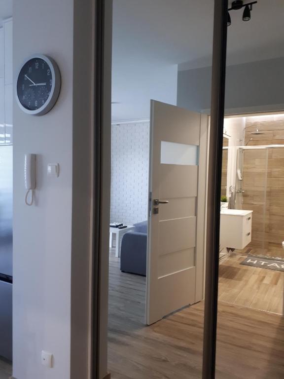Posteľ alebo postele v izbe v ubytovaní Apartamenty Limanowskiego