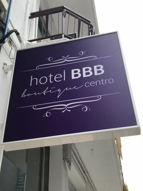 a sign for a hotel bbb sign in front of a building at Hotel Boutique Centro BBB Auto check in in Benidorm