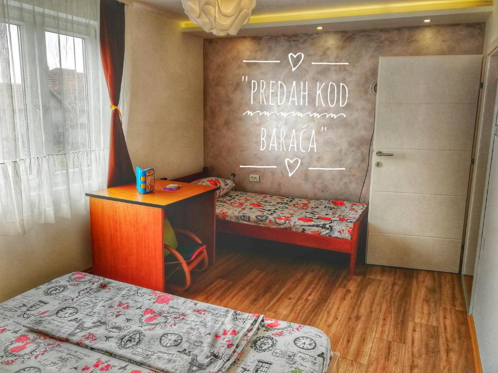 Postel nebo postele na pokoji v ubytování Apartments "Predah kod Baraća"