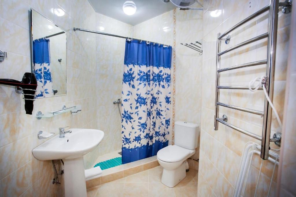 Koupelna v ubytování Hotel ACRA