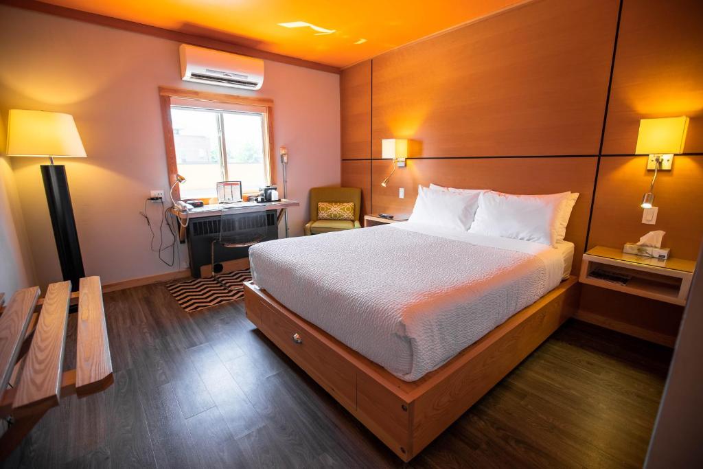 Postel nebo postele na pokoji v ubytování Adventure Hotel