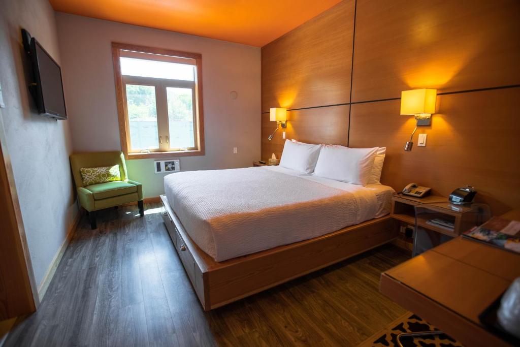 Postel nebo postele na pokoji v ubytování Adventure Hotel