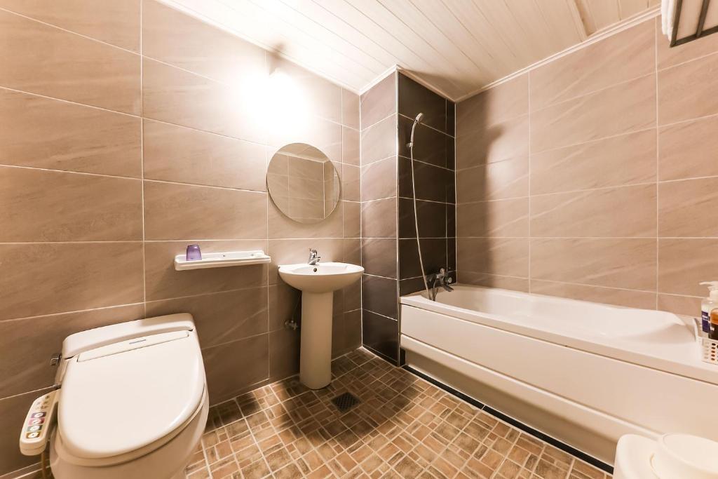 Koupelna v ubytování Kyungha Spa Hotel