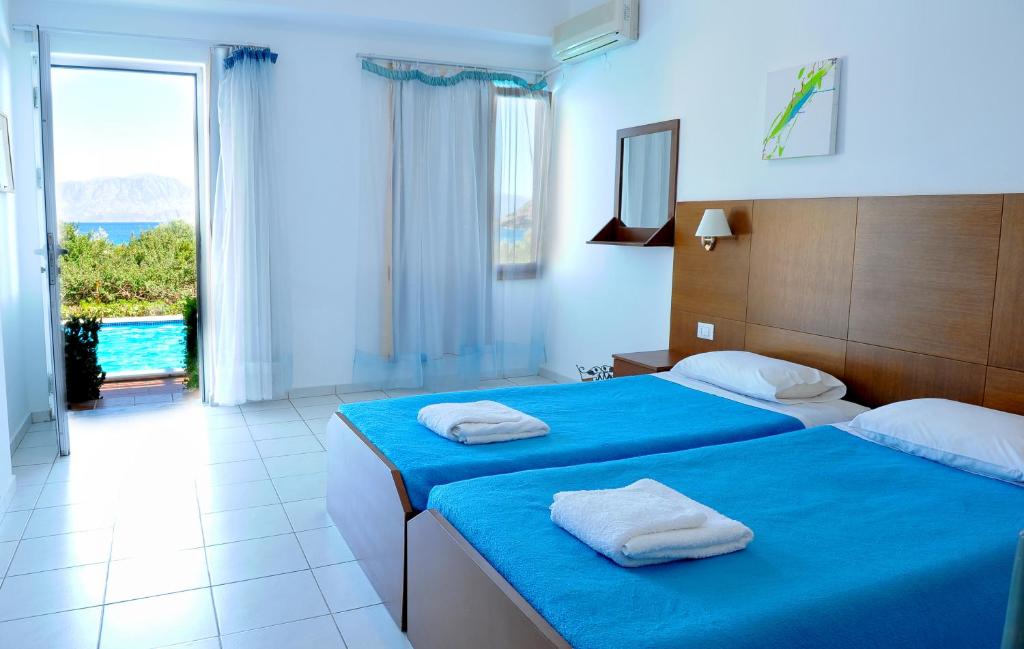Letto o letti in una camera di Mirabella Apartments