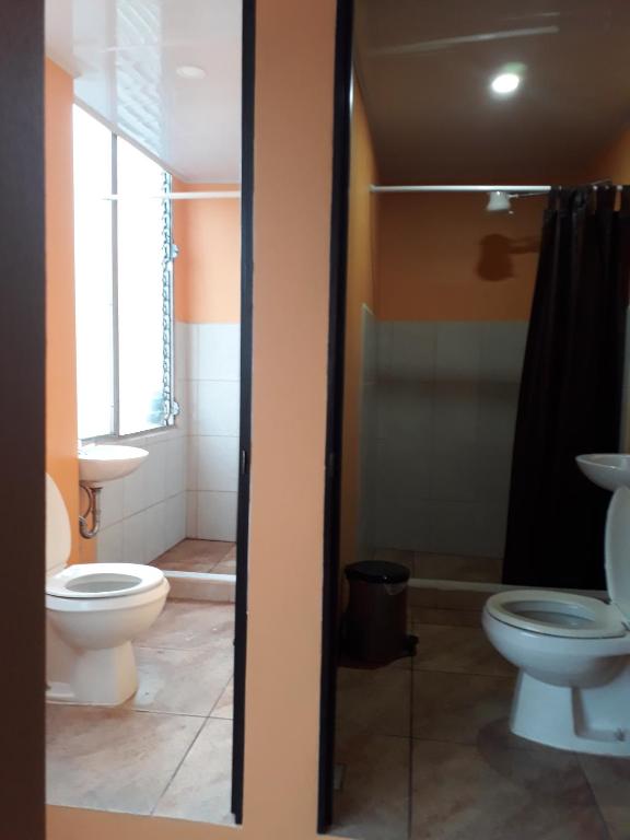 Koupelna v ubytování Hotel Latino