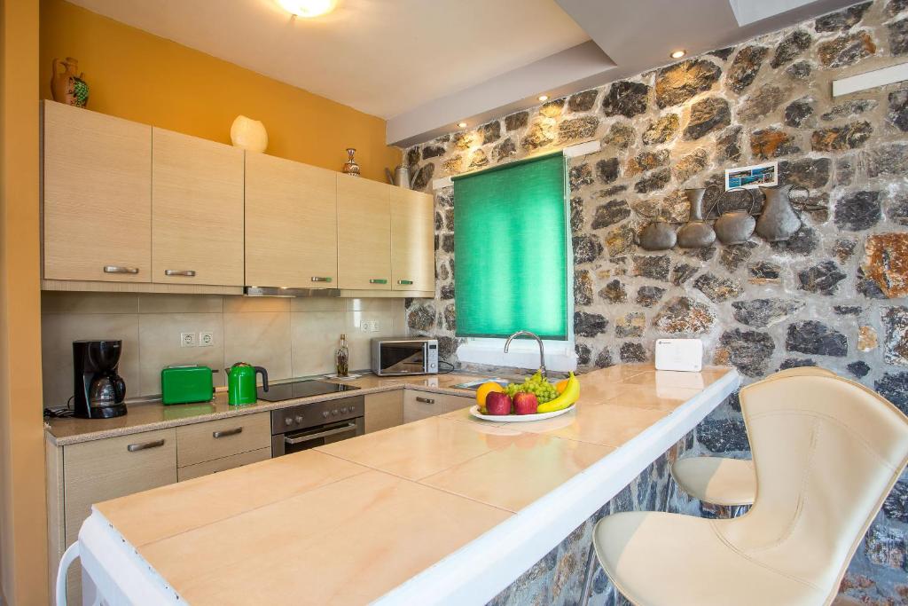 Kuchyň nebo kuchyňský kout v ubytování Villa Helios