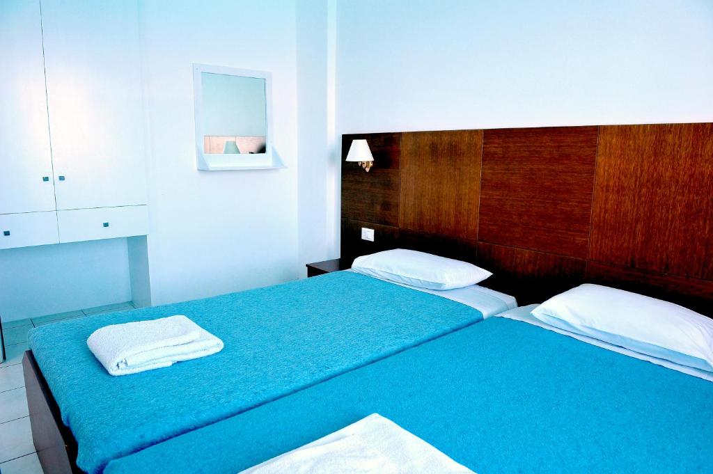 Letto o letti in una camera di Mirabella Apartments