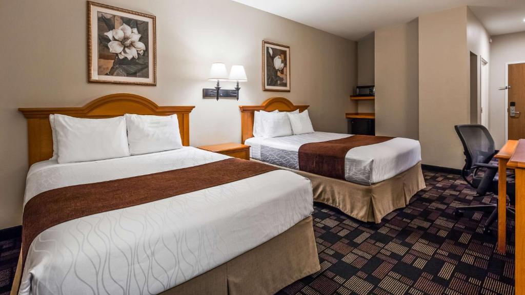 Postel nebo postele na pokoji v ubytování Best Western Longview