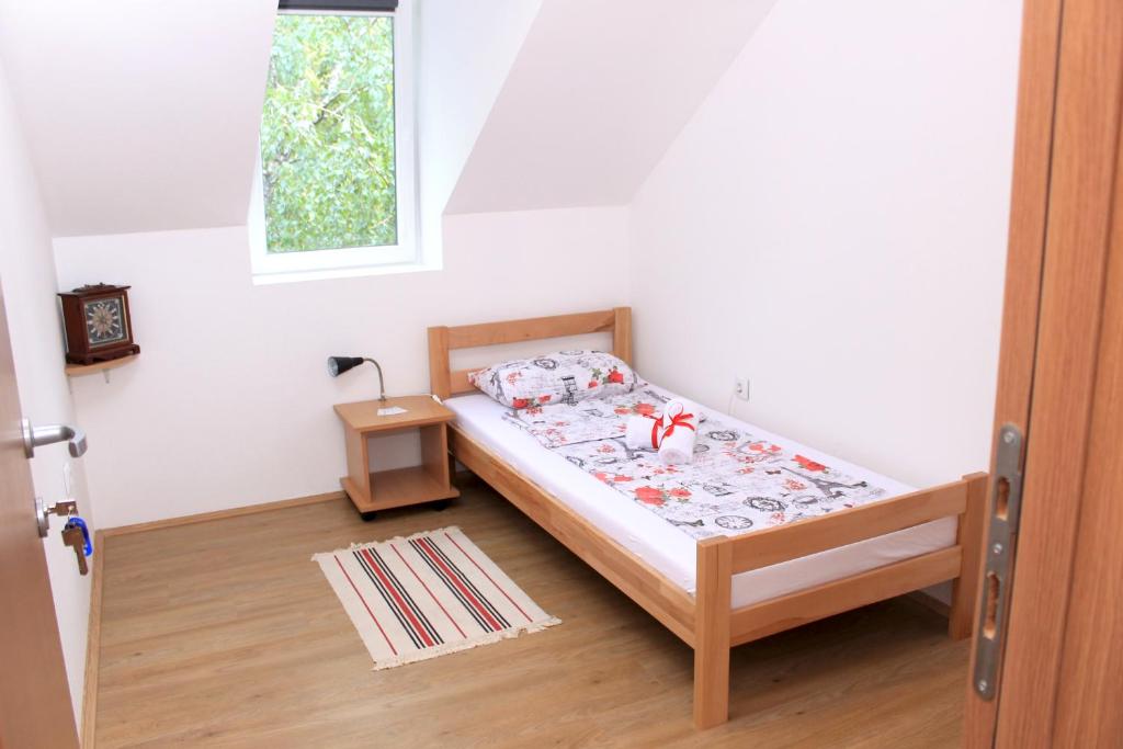 Postel nebo postele na pokoji v ubytování A&A