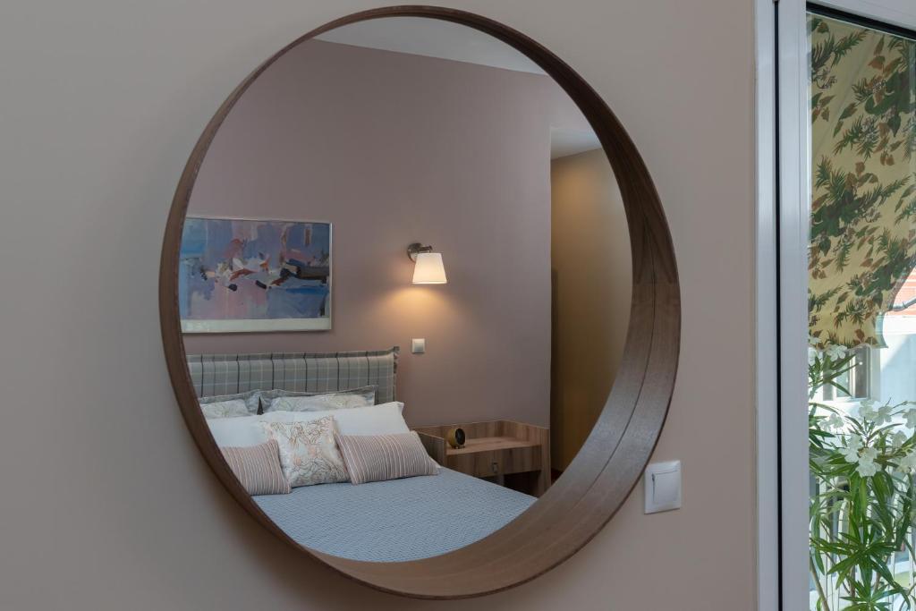 A bed or beds in a room at Absolute Athens Apartments