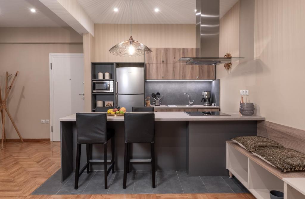 A kitchen or kitchenette at Absolute Athens Apartments