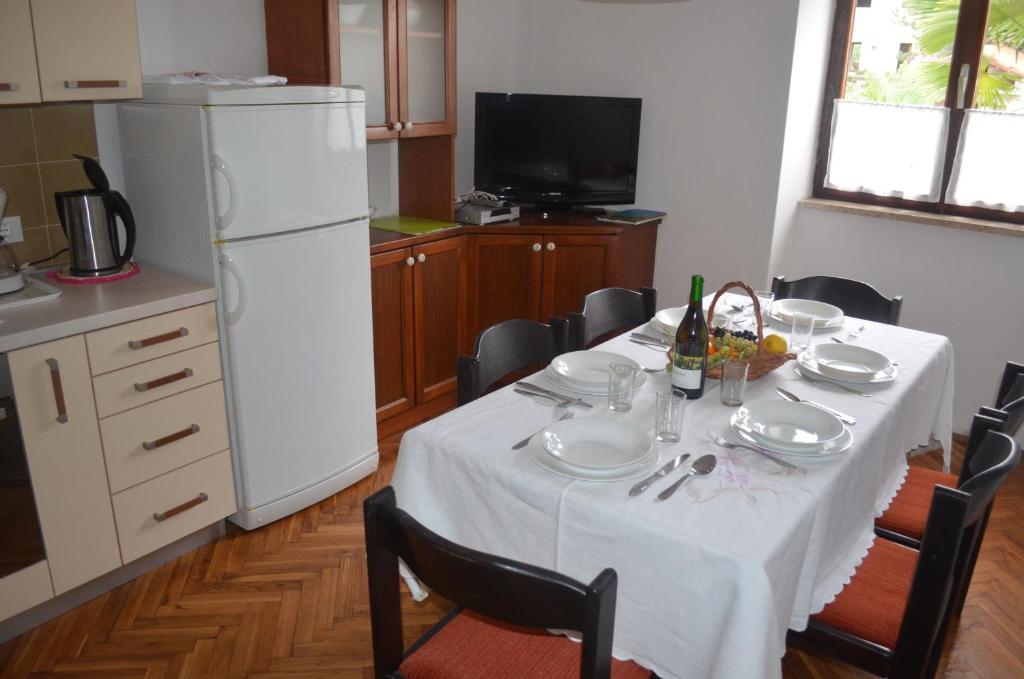 Kuchyň nebo kuchyňský kout v ubytování Apartments Mare