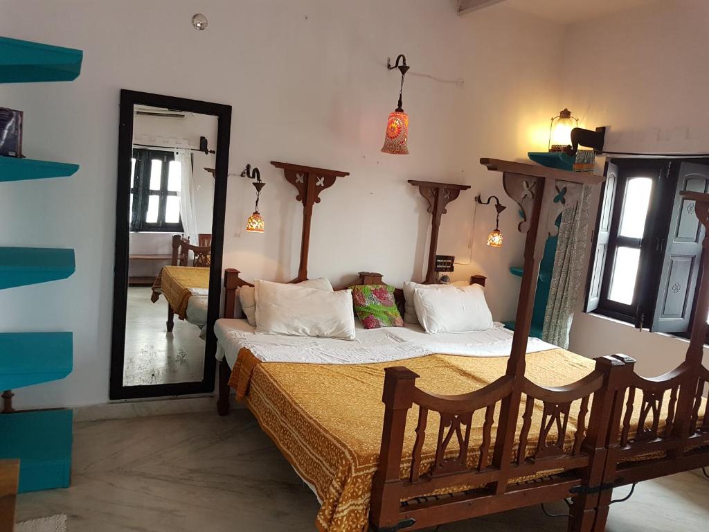 Postel nebo postele na pokoji v ubytování Inn Seventh Heaven