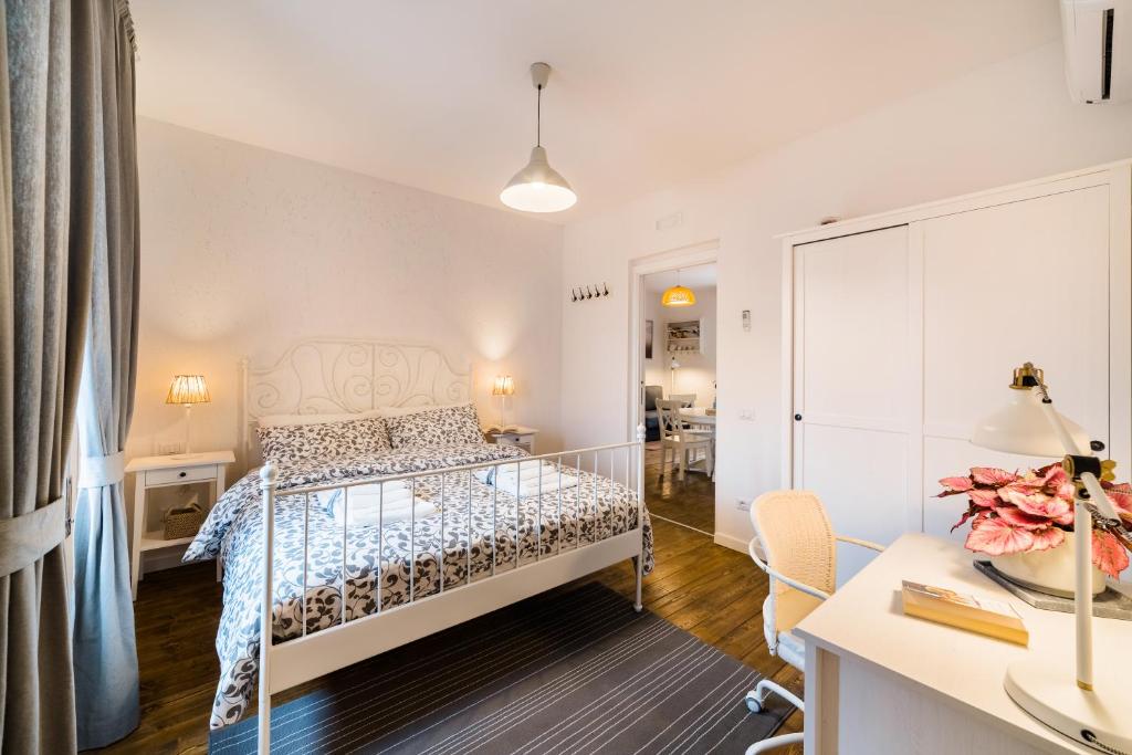 Postel nebo postele na pokoji v ubytování White Rooms