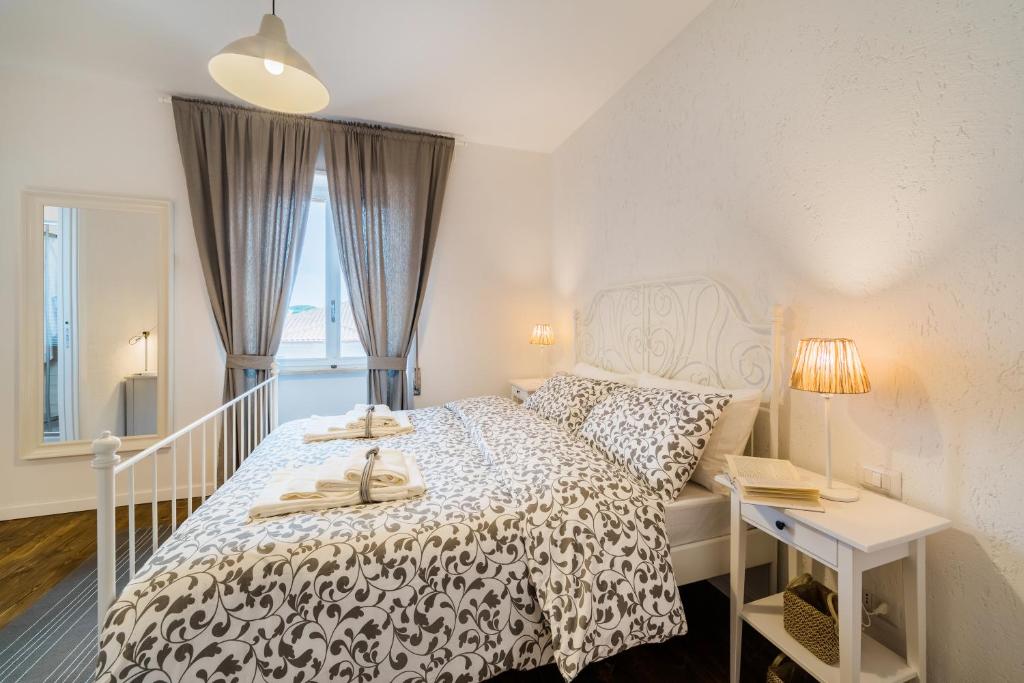 Postel nebo postele na pokoji v ubytování White Rooms