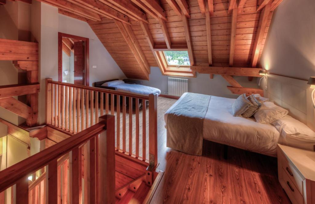 Postel nebo postele na pokoji v ubytování Apartahotel Tres Quiñones