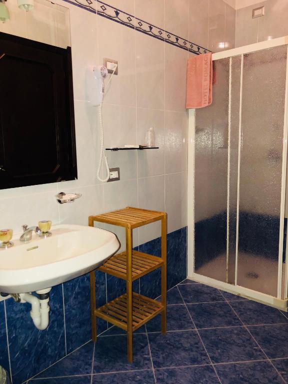 Koupelna v ubytování Hotel Romagna
