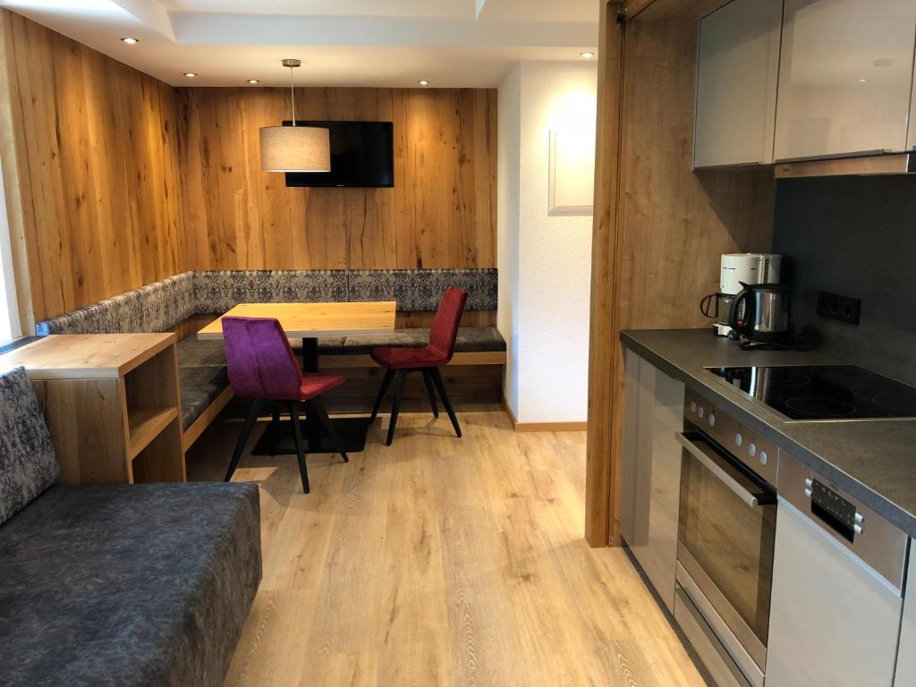 Kuchyň nebo kuchyňský kout v ubytování Hotel Garni Central - Zimmer - Studios - Apartments
