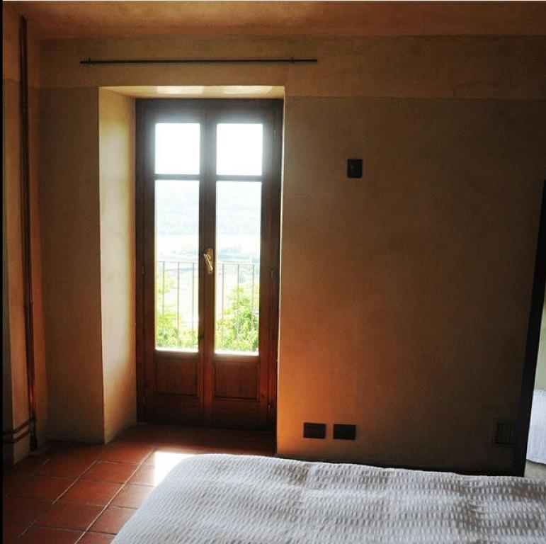 Posteľ alebo postele v izbe v ubytovaní Cascina Linét