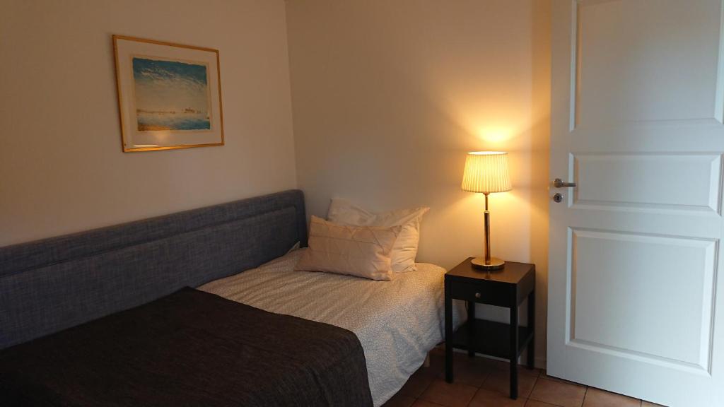 Postel nebo postele na pokoji v ubytování IGMA Lodge