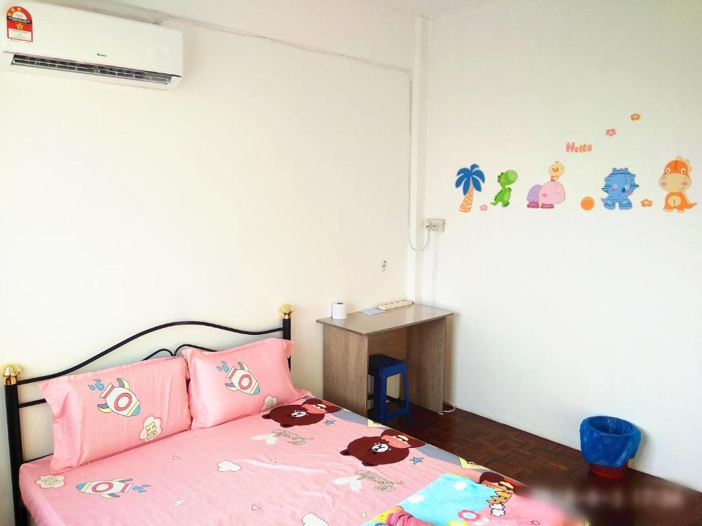 Postel nebo postele na pokoji v ubytování H Homestay Sibu - 1000Mbps 1Gbps Wifi, Astro & Auto Gate Parking Semi Detached House!