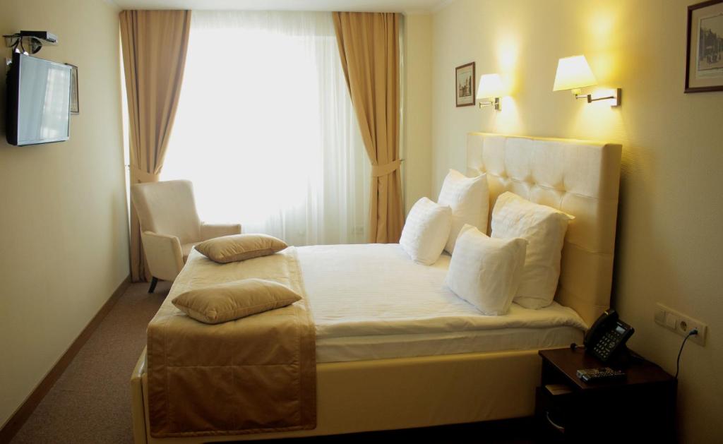 Postel nebo postele na pokoji v ubytování Hotel Asteri