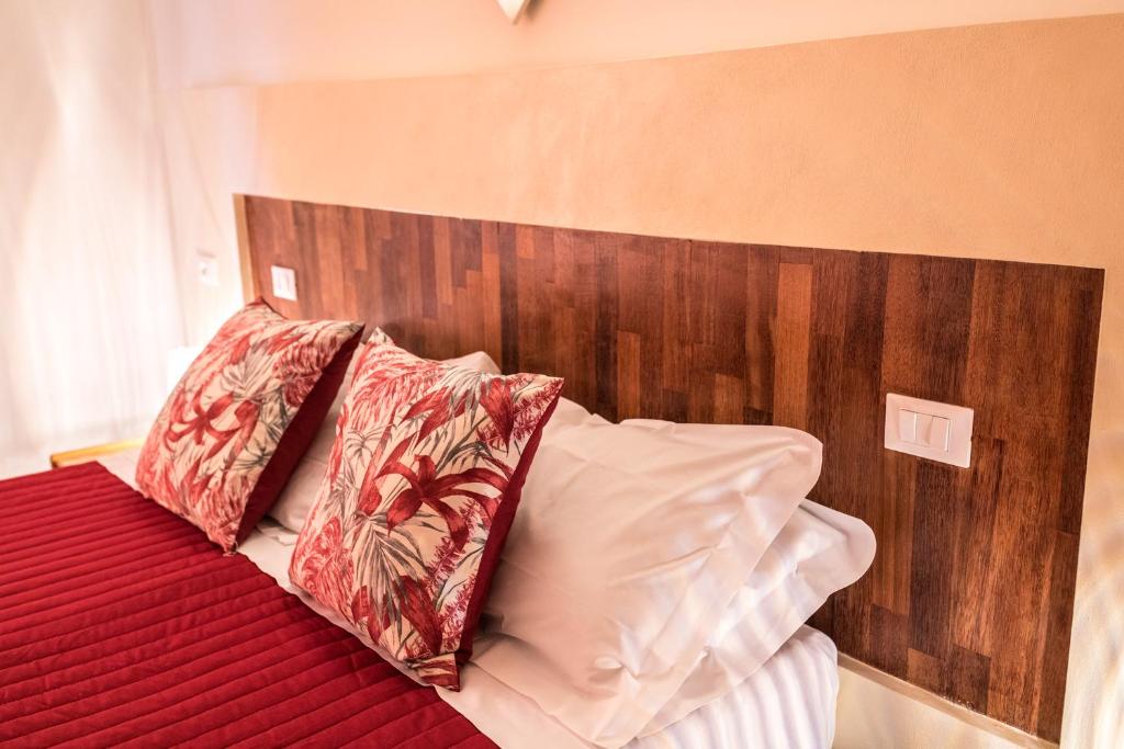 Postel nebo postele na pokoji v ubytování La Vecchia Cartiera