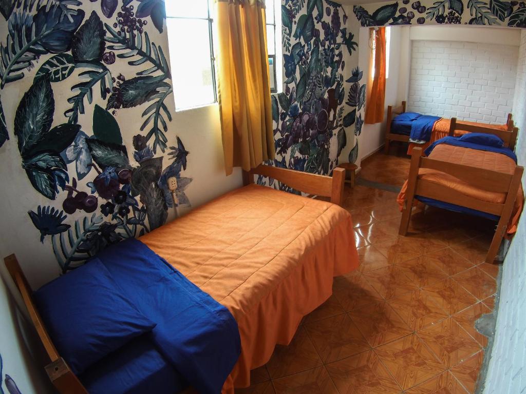 Postel nebo postele na pokoji v ubytování Aldos Guest House