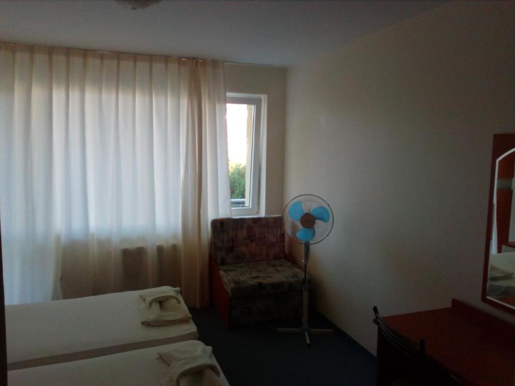 Postel nebo postele na pokoji v ubytování Family Hotel ATLAS