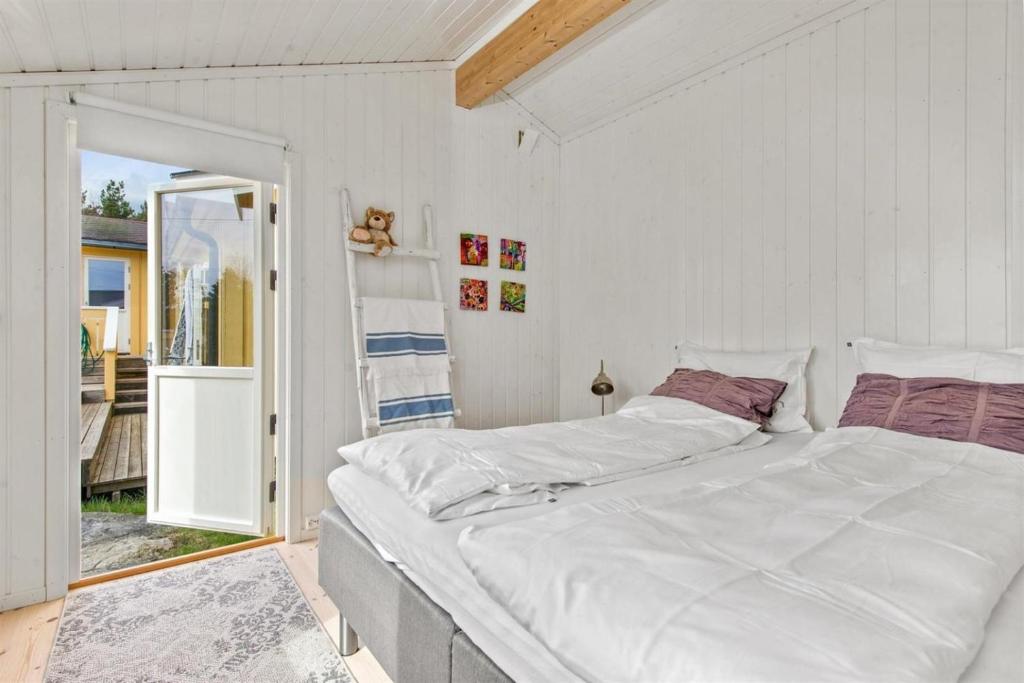 Katil atau katil-katil dalam bilik di Teibernveien 86, Larkollen (Rygge, Norways)