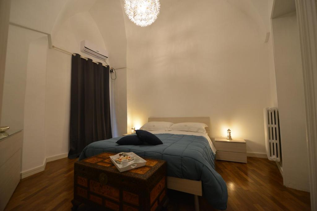 Postel nebo postele na pokoji v ubytování B&B IL SEGRETO